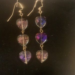 Faceted heart shaped crystal earrings.